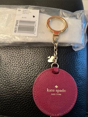 KATE SPADE NWT berry leather circle keyring bag charm with gold hardware